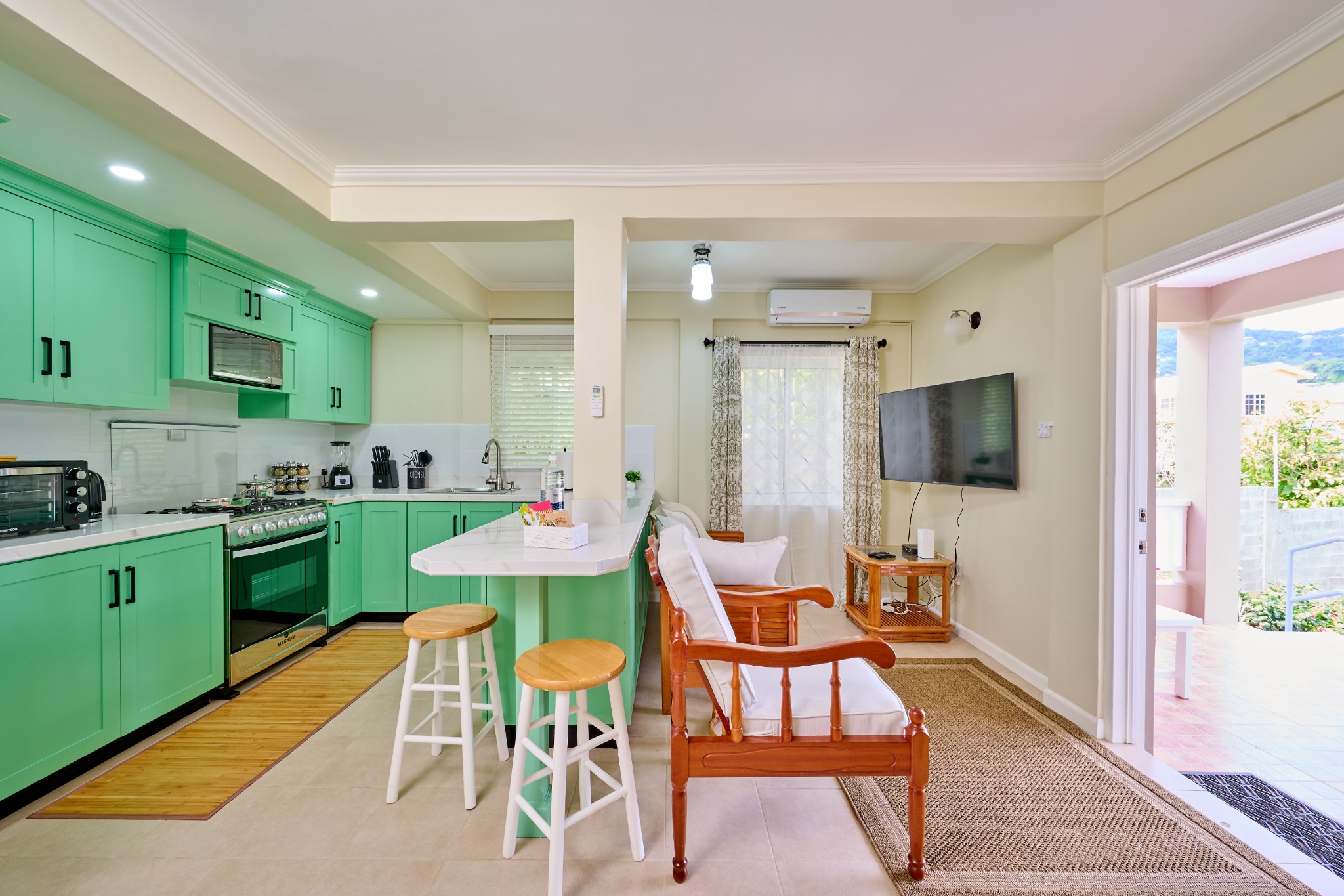 Kitchen and living area in the Garden View Suite